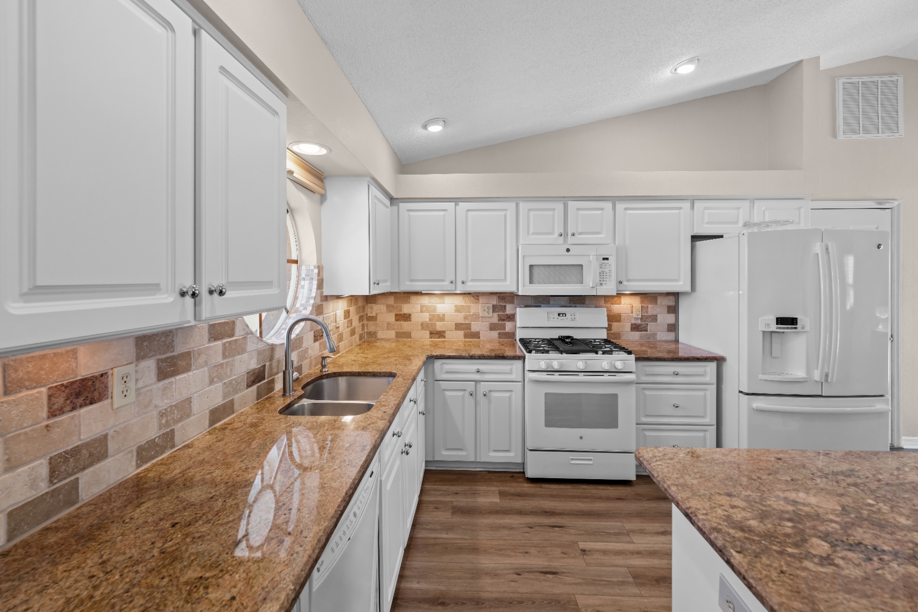 Kitchen work triangle with sink, range, and refrigerator